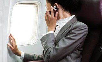 飞机上打手机通过实验 预计通话费每分钟15元
